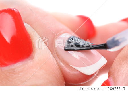 manicure, applying clear enamel manicure, applying clear enamel 10977245