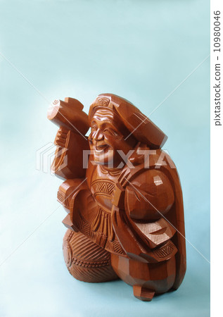 Stock Photo: the god of wealth, daikokuten, wooden