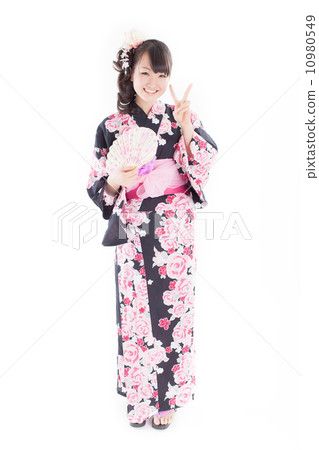 A cute girl who laughs happily with summer-like fashionable yukata A cute girl who laughs happily with summer-like fashionable yukata 10980549