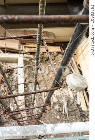 Steel rods at construction site top view 10983863