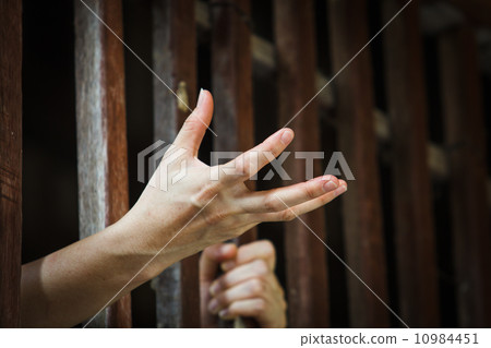 prisoner hand asking for food in jail prisoner hand asking for food in jail 10984451