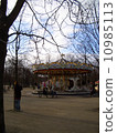 Merry-go-round of a moving amusement park 10985113