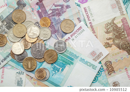 Russian money background. Rubles banknotes and coins 10985512