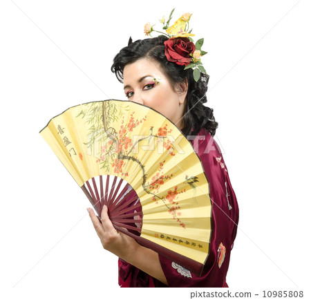 Caucasian kimono woman holding traditional fan Caucasian kimono woman holding traditional fan 10985808