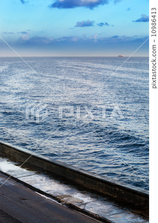 embankment, ocean and ship 10986413