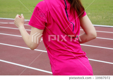 Women exercising at the stadium Women exercising at the stadium 10987072