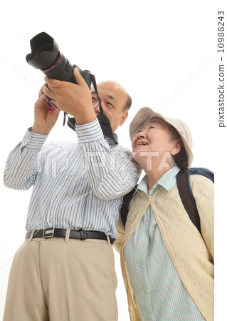 A couple while traveling 10988243