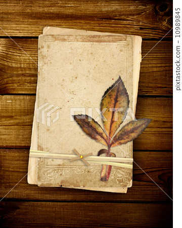 Old cards on wooden planks Old cards on wooden planks 10989845