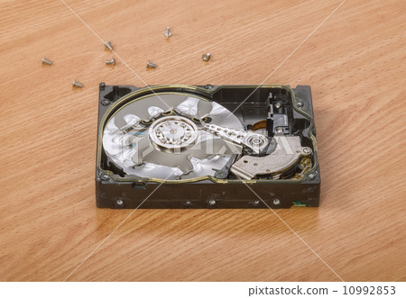 Damaged hard drive is on the table Damaged hard drive is on the table 10992853