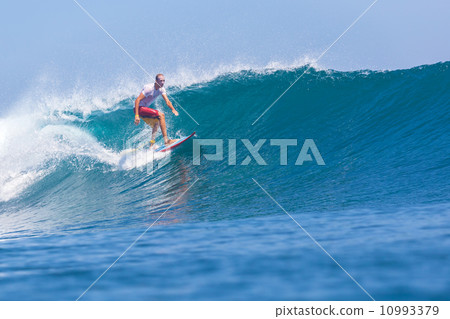 Surfing a wave. 10993379