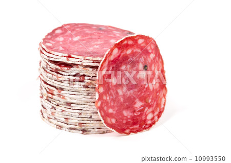 Slices of salami sausage on a white background Slices of salami sausage on a white background 10993550