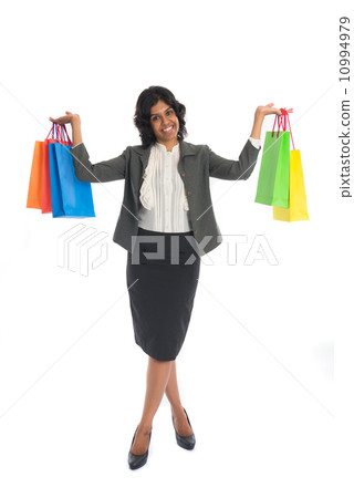 indian woman shopping with bags full body isolated on white indian woman shopping with bags full body isolated on white 10994979