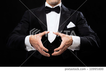 magician showing trick magician showing trick 10995800