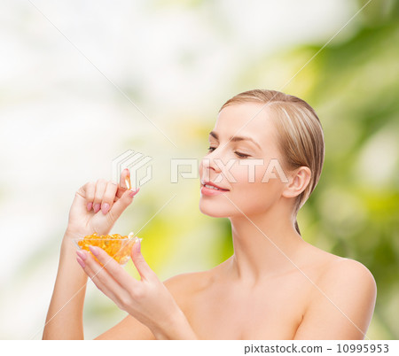 lovely woman with omega 3 vitamins lovely woman with omega 3 vitamins 10995953