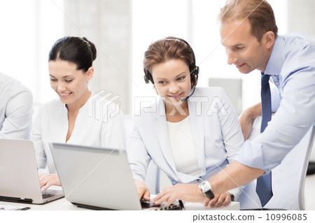 group of people working in call center 10996085