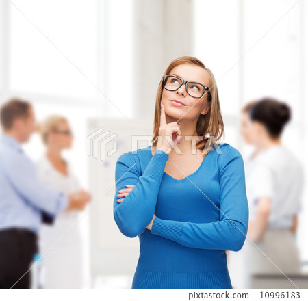 happy woman in black eyeglasses dreaming happy woman in black eyeglasses dreaming 10996183