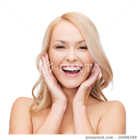 woman touching her face skin woman touching her face skin 10996399