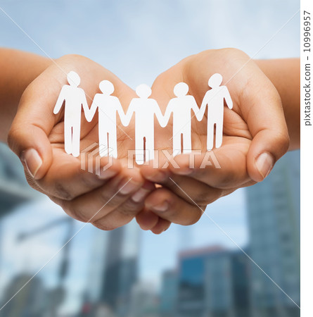 womans hands with paper team womans hands with paper team 10996957