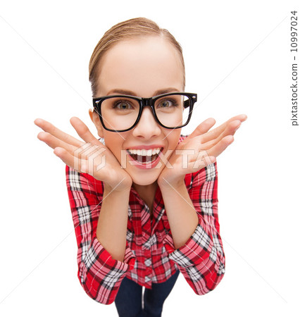 smiling teenager in eyeglasses screaming smiling teenager in eyeglasses screaming 10997024