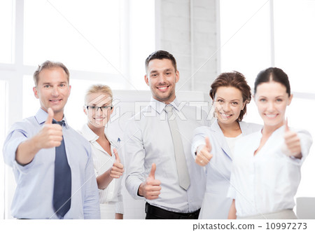 business team showing thumbs up in office business team showing thumbs up in office 10997273
