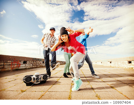 group of teenagers dancing group of teenagers dancing 10997404