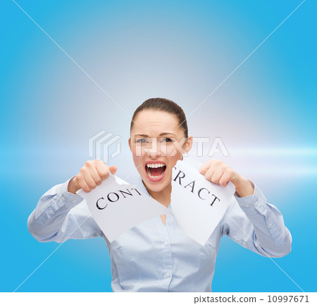 serious businesswoman tearing contract serious businesswoman tearing contract 10997671