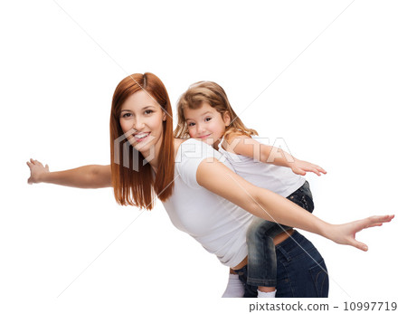 happy mother and child doing piggy back happy mother and child doing piggy back 10997719