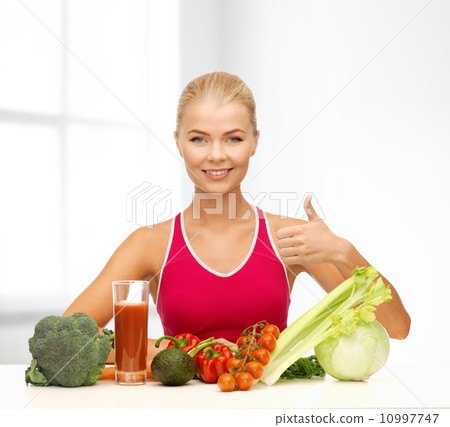 smiling woman with organic food 10997747