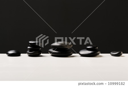 closeup of hot massage stones closeup of hot massage stones 10999182