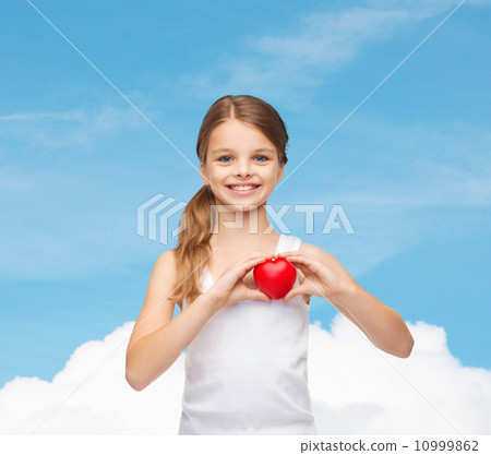 girl in blank white shirt with small red heart 10999862