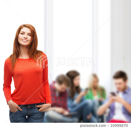 smiling teen girl at school 10999870