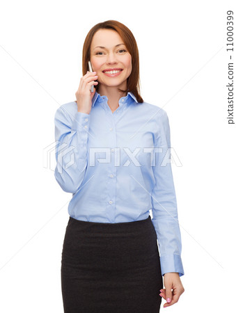young smiling businesswoman with smartphone 11000399