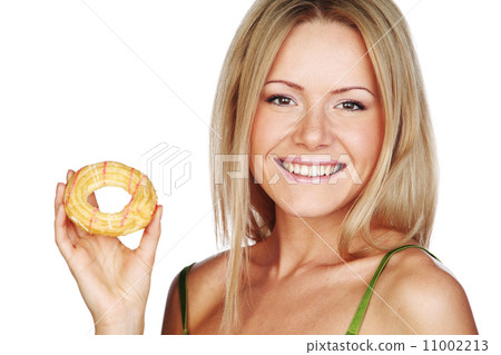woman eating a cake 11002213