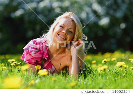 girl on dandelion field girl on dandelion field 11002394