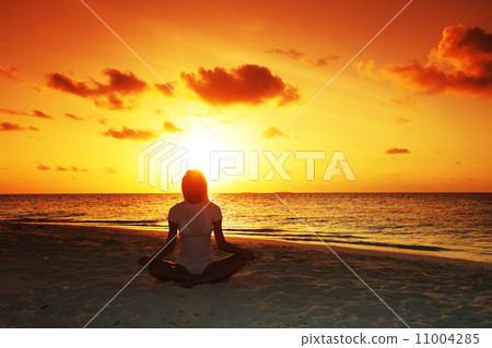 sunset yoga woman sunset yoga woman 11004285