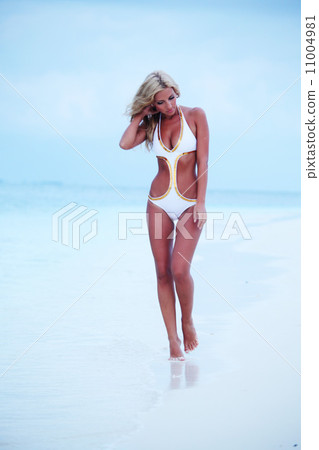 woman on the sand the ocean coast woman on the sand the ocean coast 11004981