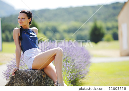 Beautiful woman outdoors 11005536