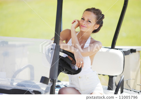 woman in golf car 11005796