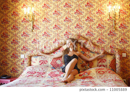 Beautiful woman on a sofa Beautiful woman on a sofa 11005889