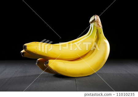 Bananas on black background Bananas on black background 11010235