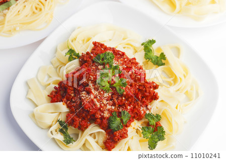 Plates with spaghetti bolognese Plates with spaghetti bolognese 11010241