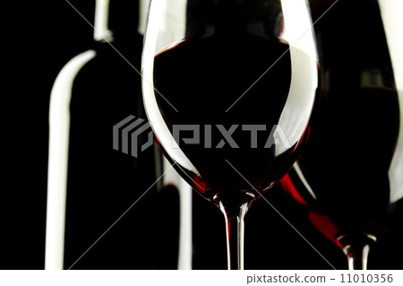 Red Wine Glass silhouette Black Background Red Wine Glass silhouette Black Background 11010356