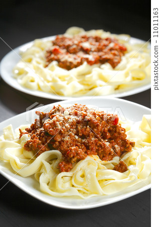 Spaghetti bolognese with parmesan cheese Spaghetti bolognese with parmesan cheese 11011163