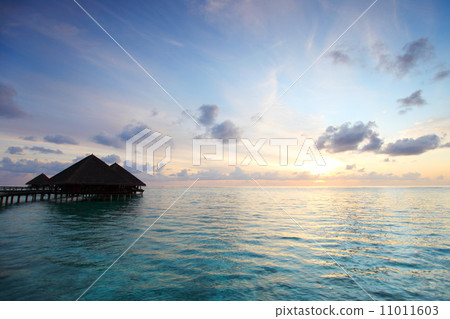 maldivian houses on sunrise 11011603