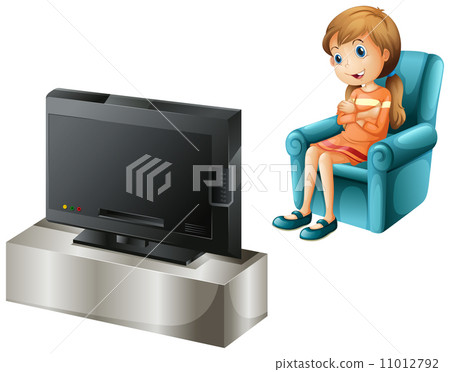 A young girl watching TV happily 11012792
