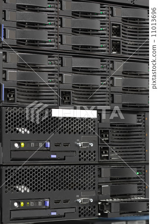 servers stack with hard drives in a datacenter 11013696