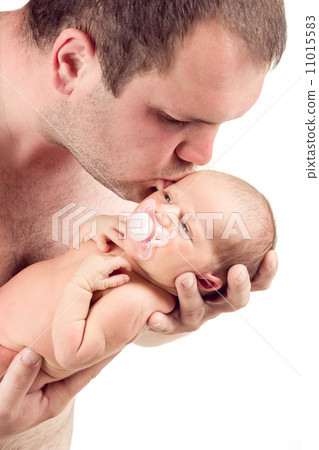 Loving father kissing his baby 11015583
