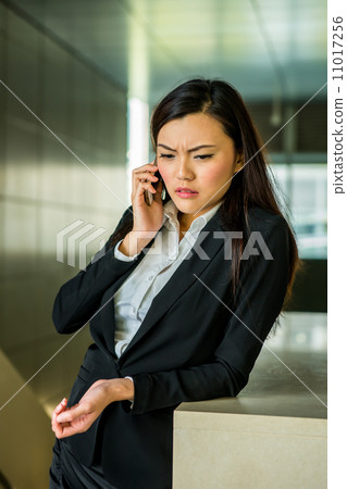 Business woman with phone 11017256