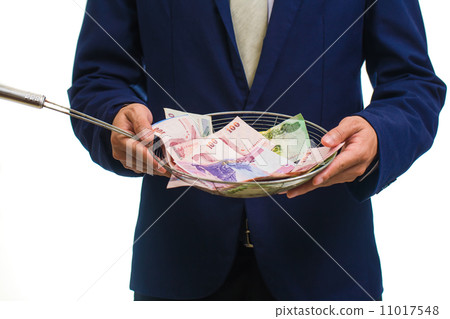 Portrait of a businessman holding money in hand 11017548