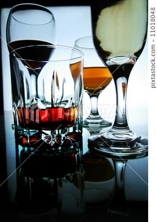 Different Alcoholic Drinks in glass and goblets 11018048